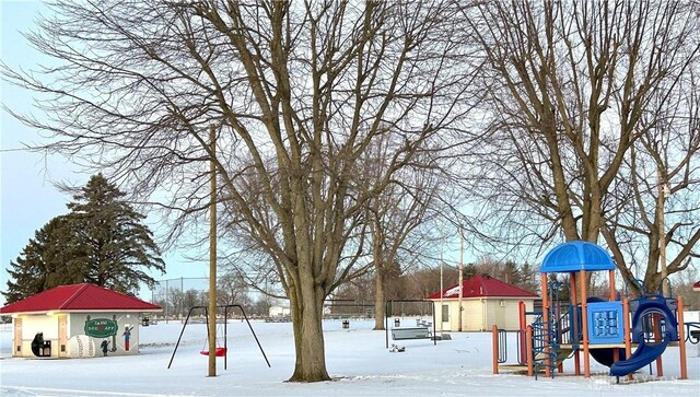 view of snow covered playground