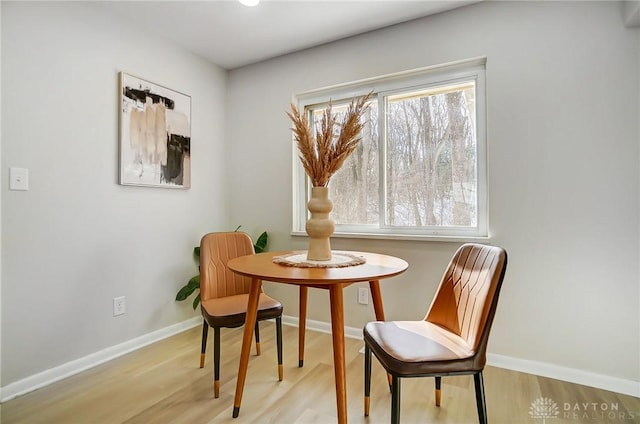 sitting room featuring light hardwood / wood-style flooring