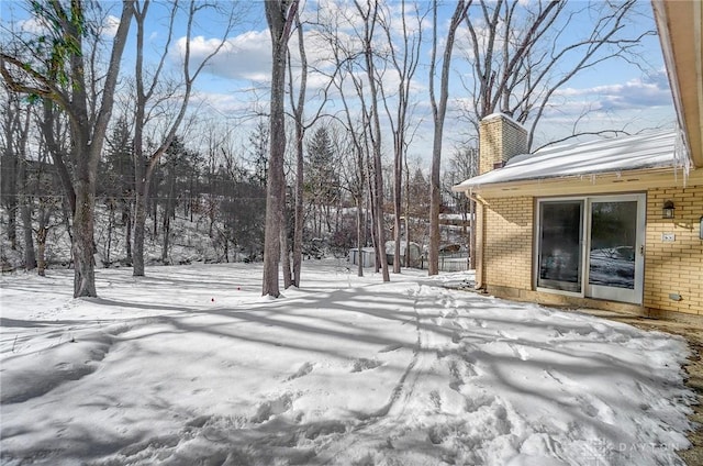 view of snowy yard