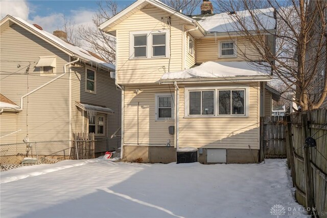 view of snow covered property