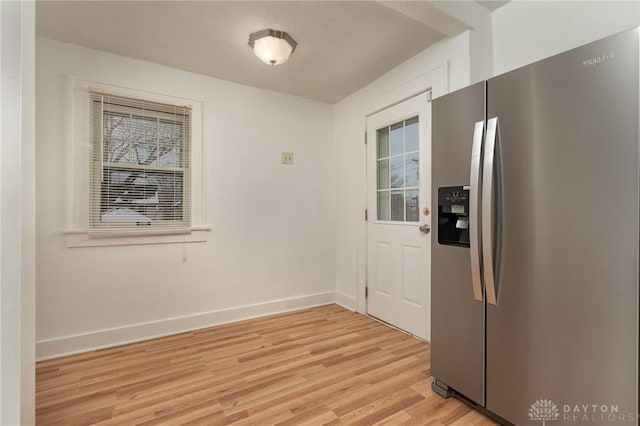 interior space featuring a wealth of natural light and light hardwood / wood-style flooring