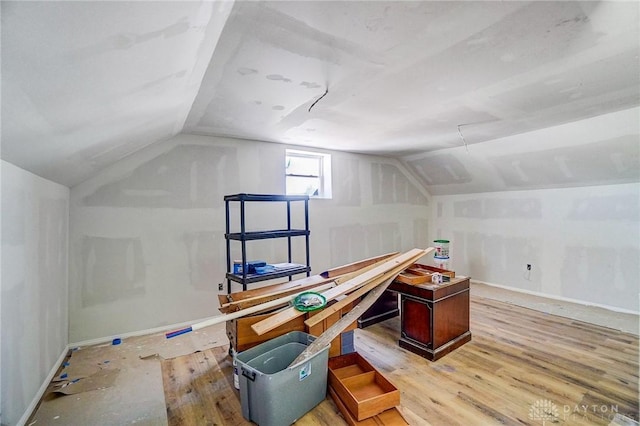 additional living space with lofted ceiling