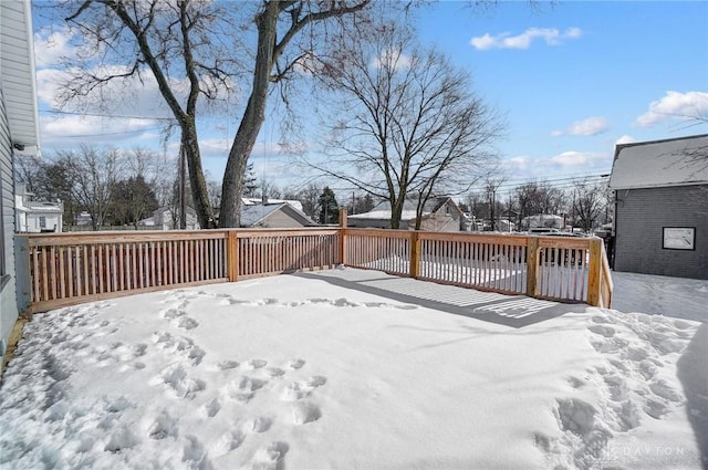 view of snow covered deck