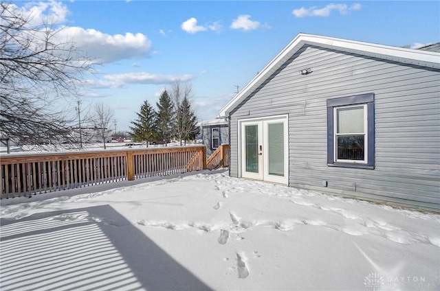 view of snow covered deck