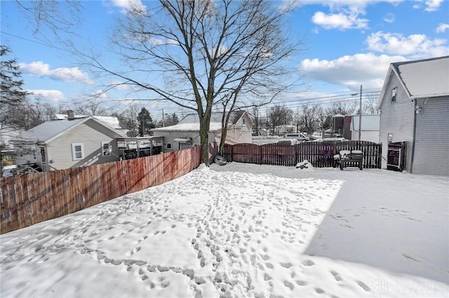 view of yard covered in snow