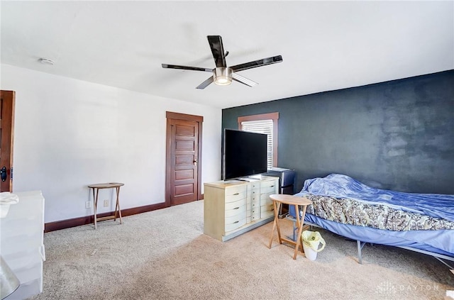 bedroom with ceiling fan and carpet