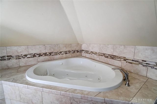 bathroom featuring tiled bath