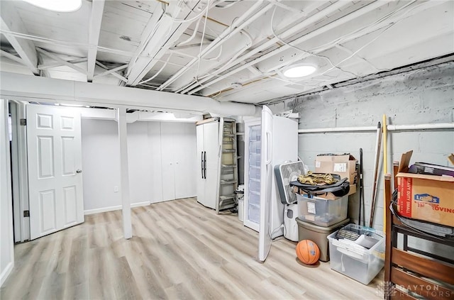 basement with light wood-type flooring