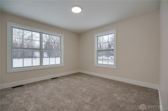 view of carpeted empty room