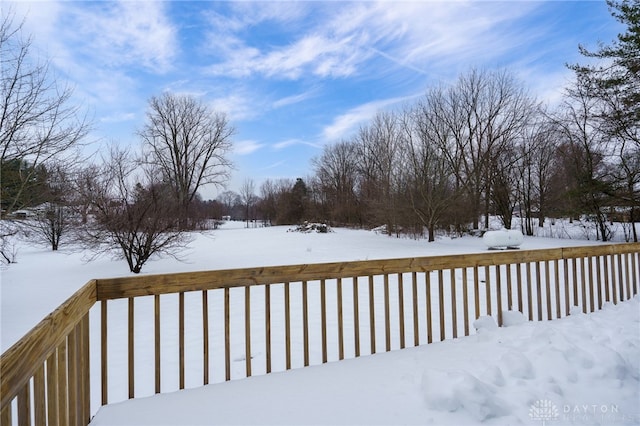 view of snow covered deck