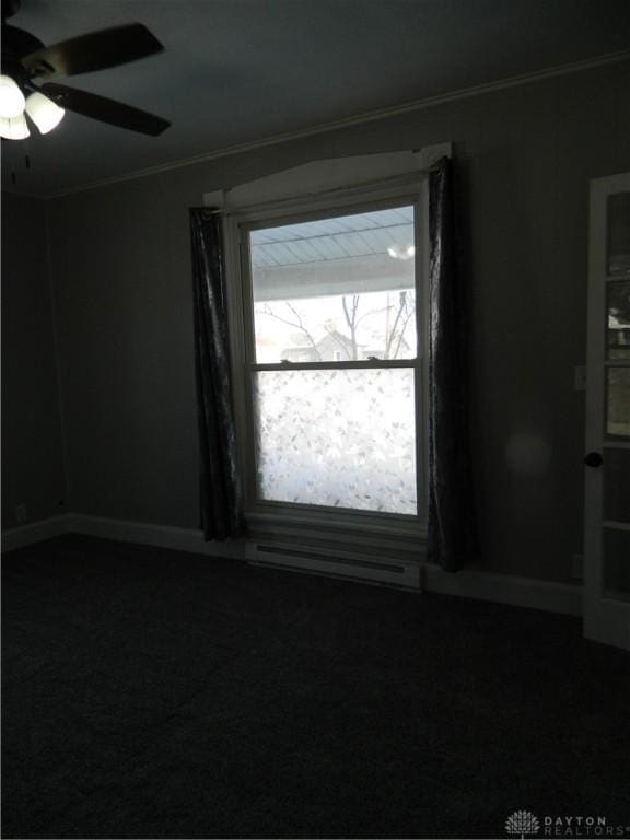 spare room with ceiling fan