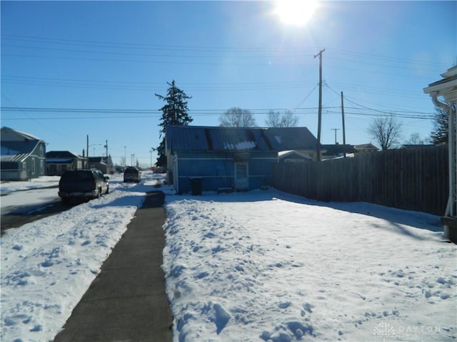 view of yard covered in snow