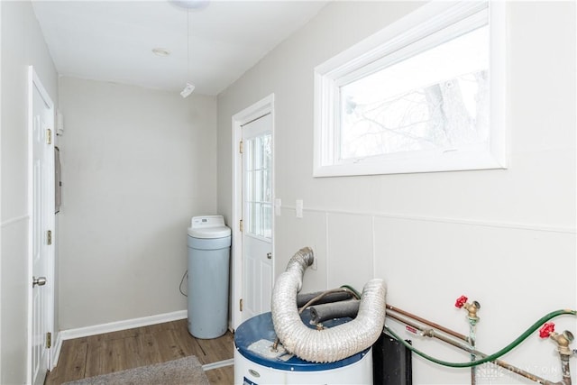 bathroom with hardwood / wood-style floors