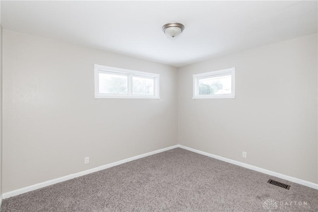 view of carpeted spare room