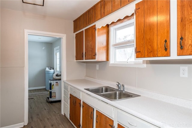 kitchen featuring dark hardwood / wood-style flooring and sink