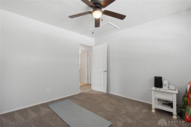 interior space with ceiling fan