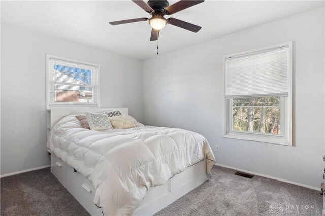 carpeted bedroom featuring ceiling fan