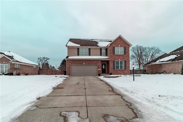 view of front of home with a garage