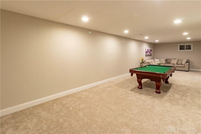 rec room with billiards and light colored carpet