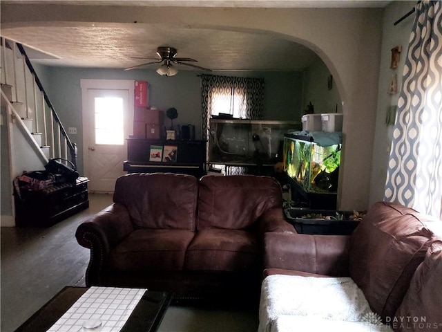 living room featuring ceiling fan