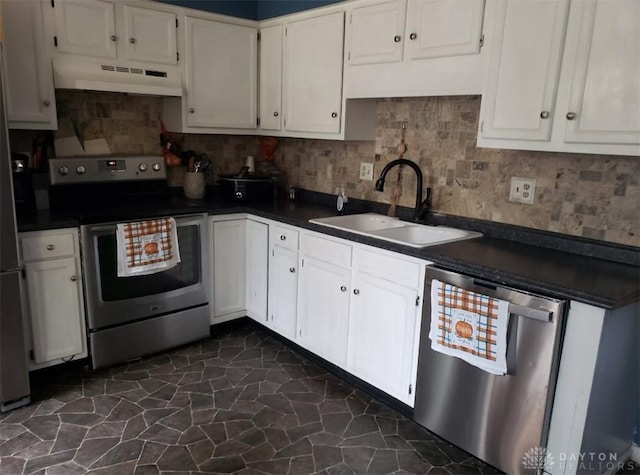 kitchen featuring sink, decorative backsplash, white cabinetry, and appliances with stainless steel finishes