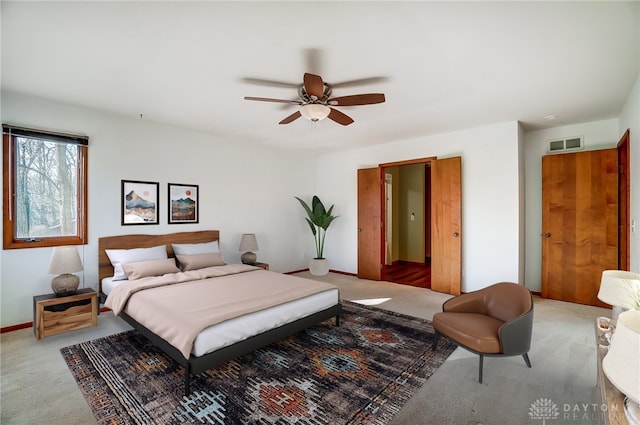 bedroom featuring ceiling fan and carpet floors