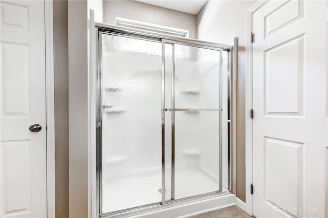 bathroom featuring walk in shower