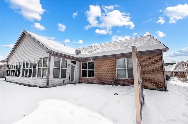 view of snow covered property