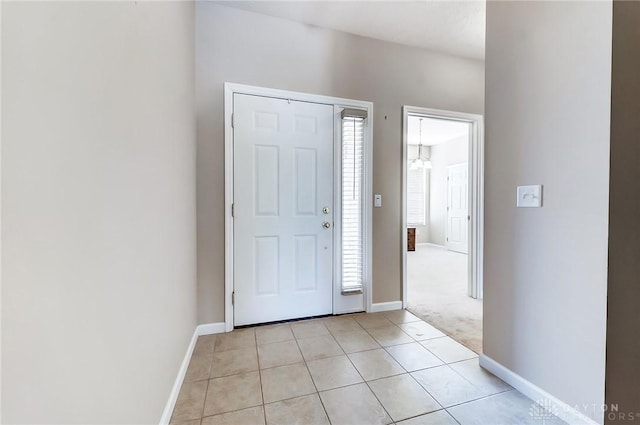 view of carpeted foyer