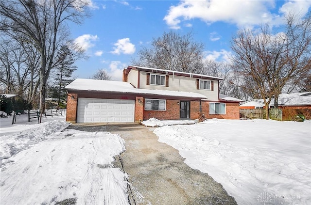 front of property with a garage