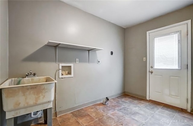 laundry area featuring hookup for a washing machine, sink, and hookup for an electric dryer