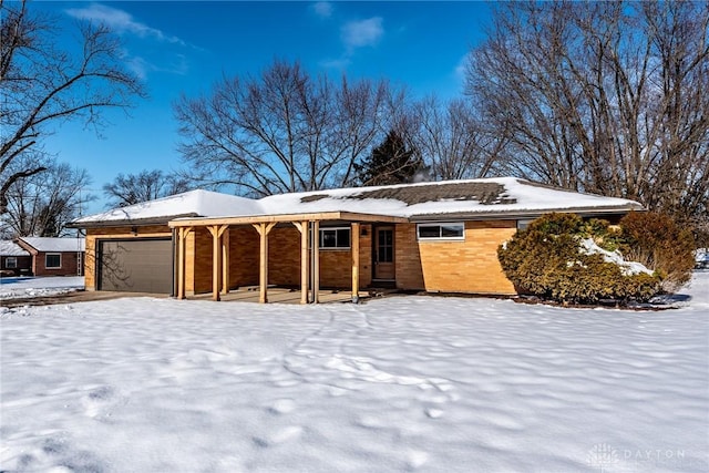 single story home with a garage