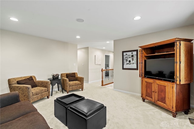 living room featuring light carpet