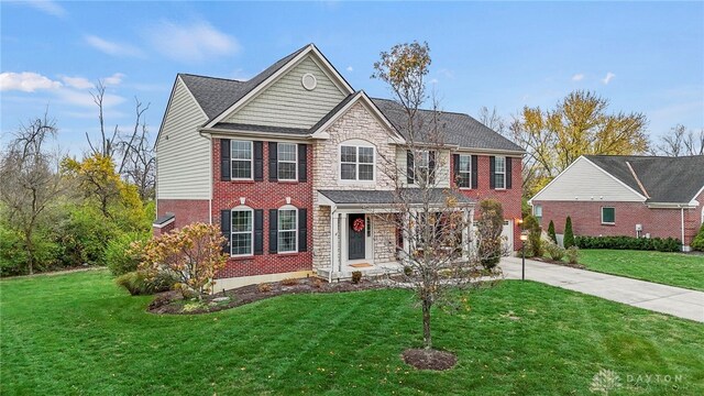 view of front of home featuring a front lawn