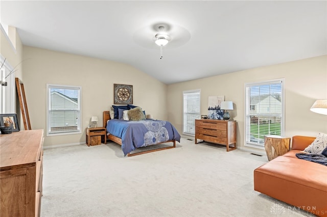 carpeted bedroom featuring ceiling fan and lofted ceiling