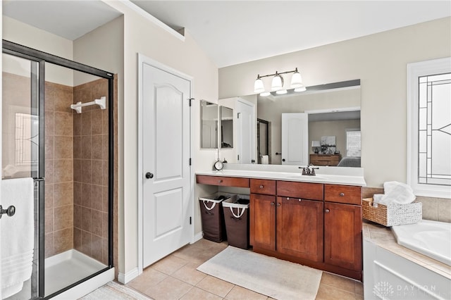 bathroom with vanity, independent shower and bath, and tile patterned floors