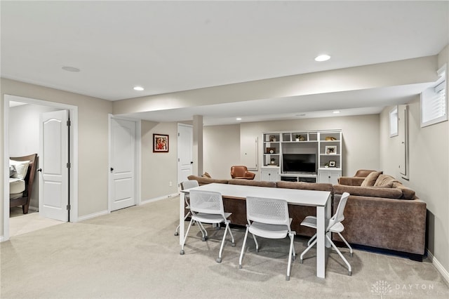 view of carpeted dining space