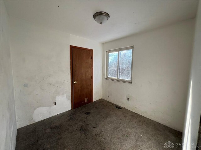 empty room with carpet floors