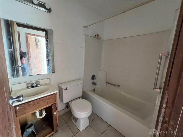 full bathroom with toilet, tile patterned flooring, shower / bath combination, and vanity