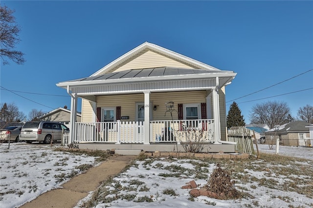 bungalow-style home with covered porch