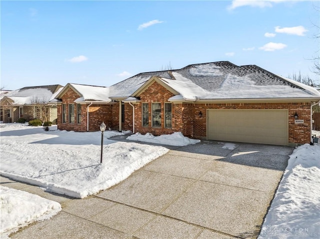 ranch-style house featuring a garage