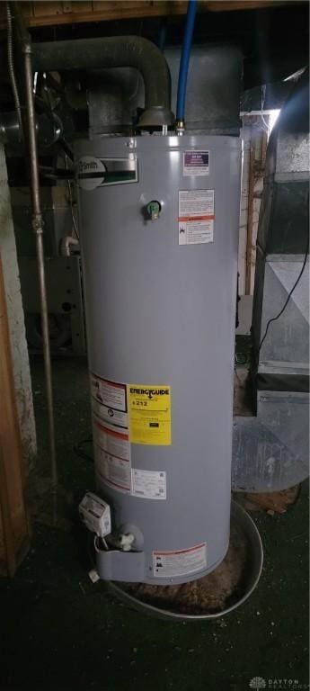 utility room featuring gas water heater