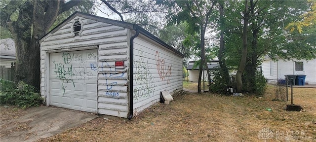 view of outdoor structure with a garage