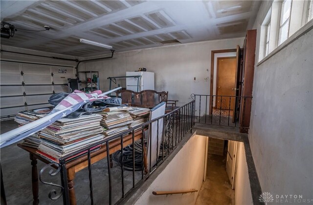 garage featuring white refrigerator