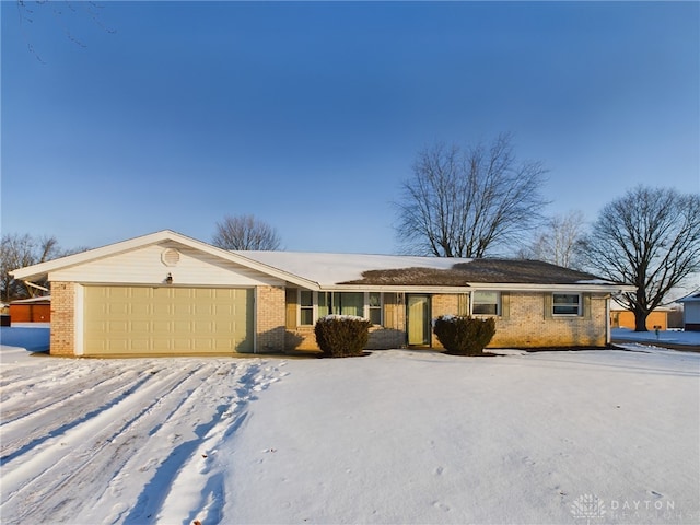 ranch-style home with a garage