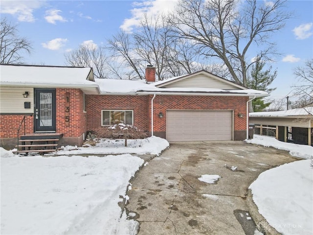 single story home with a garage