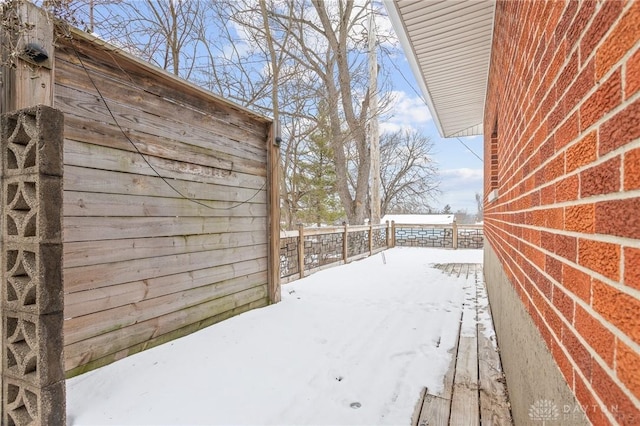 view of yard covered in snow