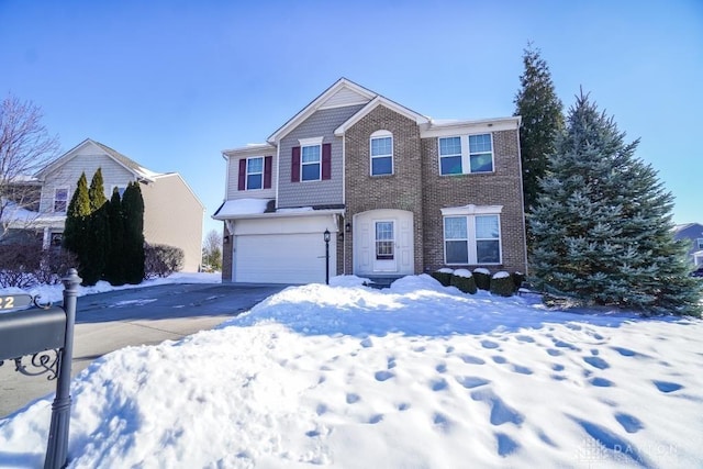 view of front of home featuring a garage