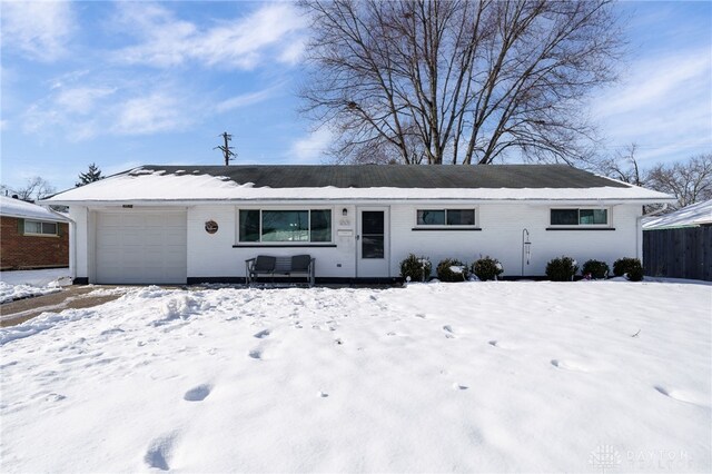 single story home with a garage