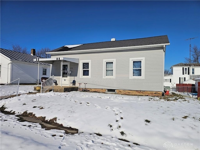 view of snow covered property